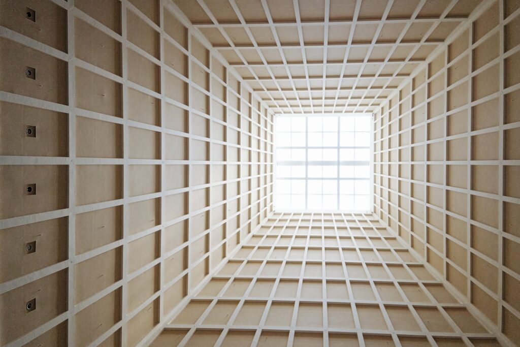 a room that has a window in the middle of it