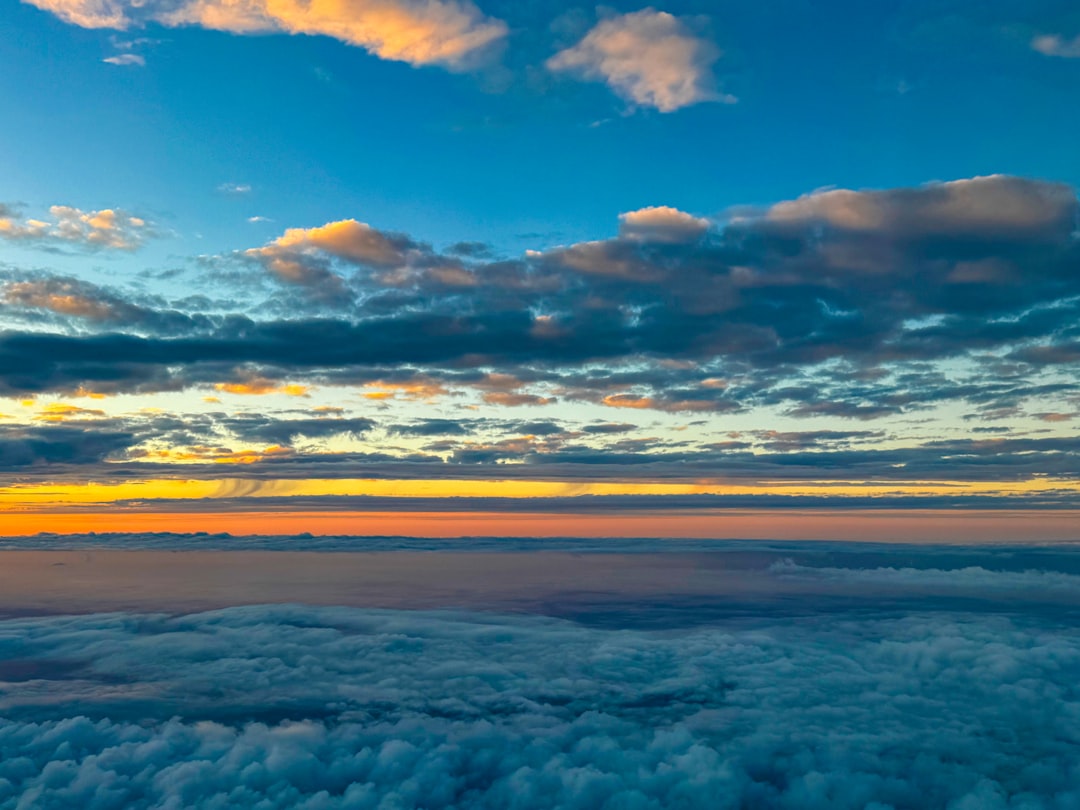 a view of the sky and clouds from an airplane