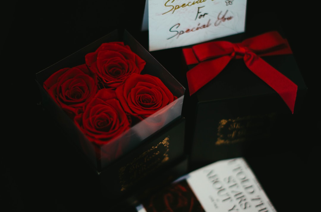 a black box with red roses in it