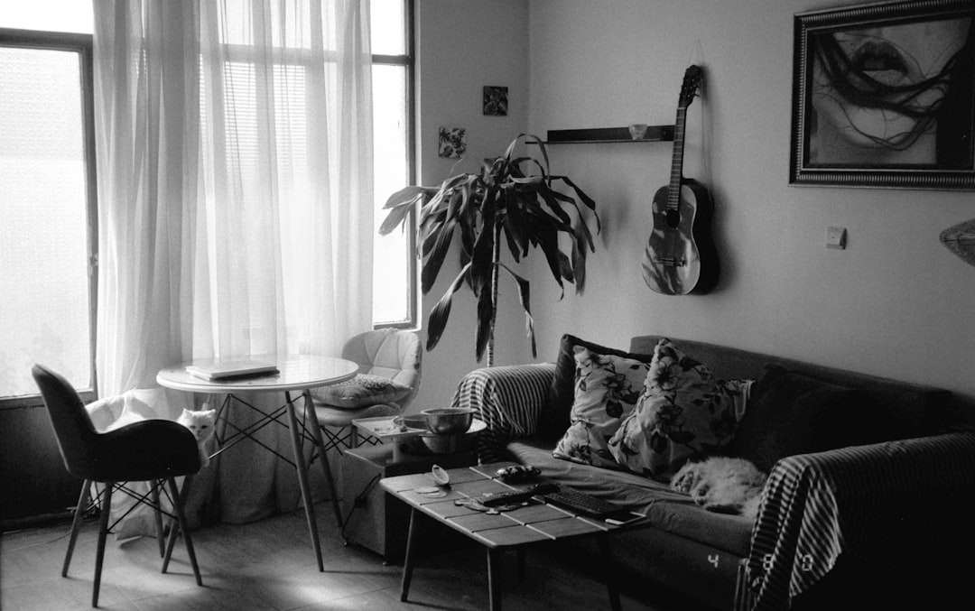 a black and white photo of a living room