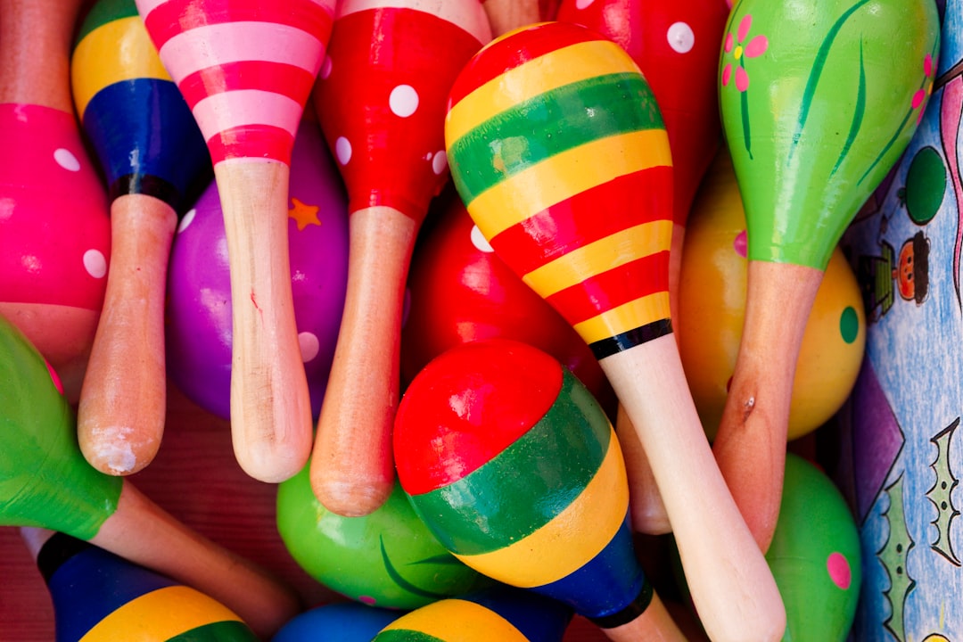A close up of many colorful wooden toys
