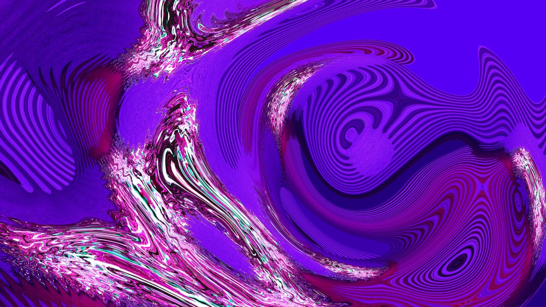 Abstract swirls of purple and white are showcased.
